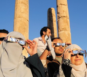 ALI JAREKJI/REUTERS Observers in Amman, Jordan, watch the transit of Venus across the Sun in June 2012.